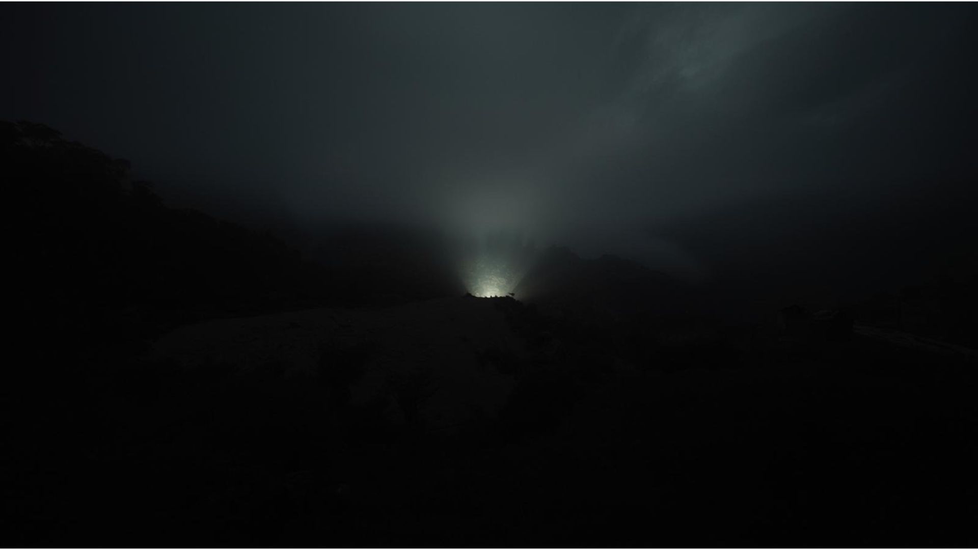 A breath of mist crossing the cordillera at first light.